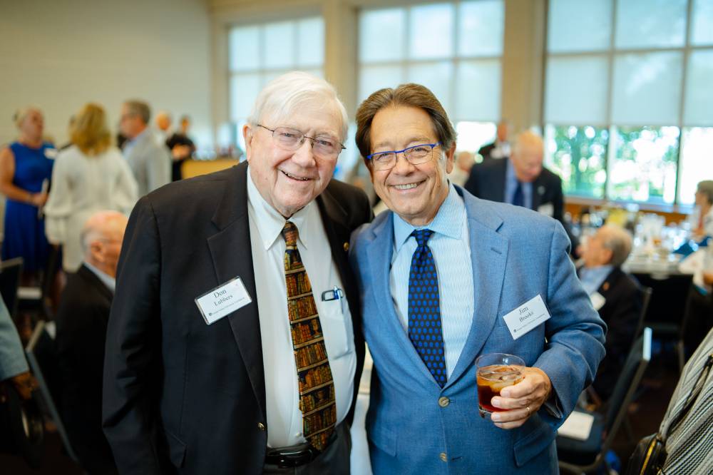President Emeritus Don Lubbers posing with Jim Brooks at the Foundation Annual Meeting